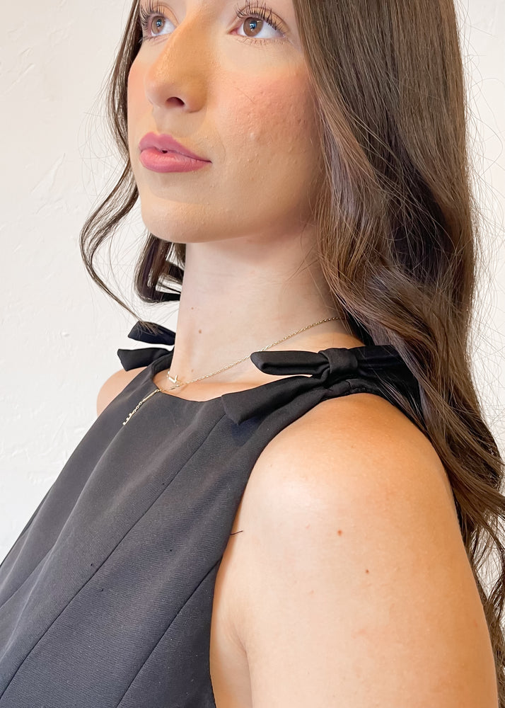 Noir Belle Peplum Bow Top | Black